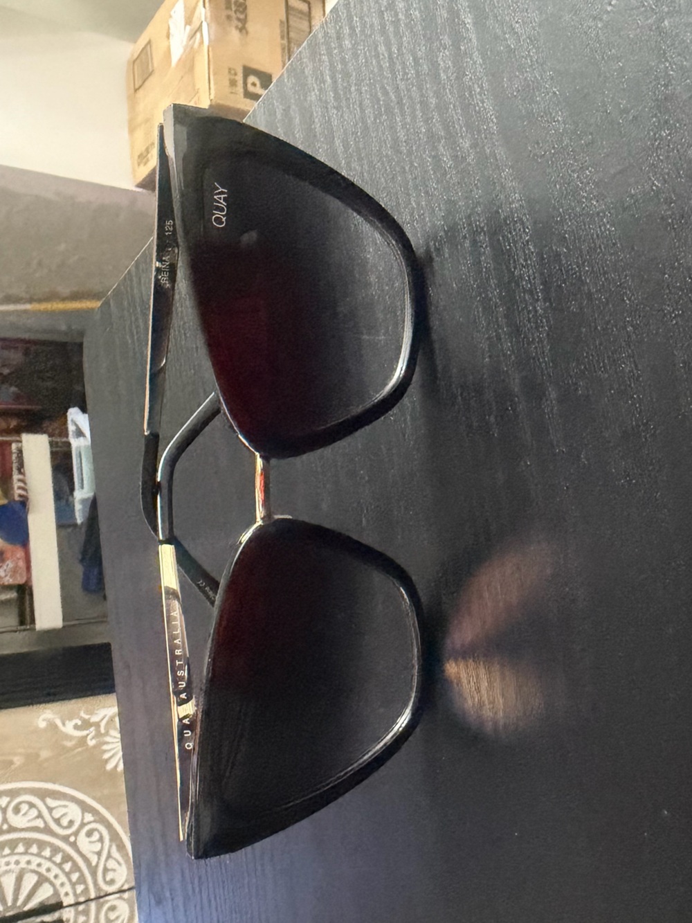 Quay Australia women's black and gold Sunglasses